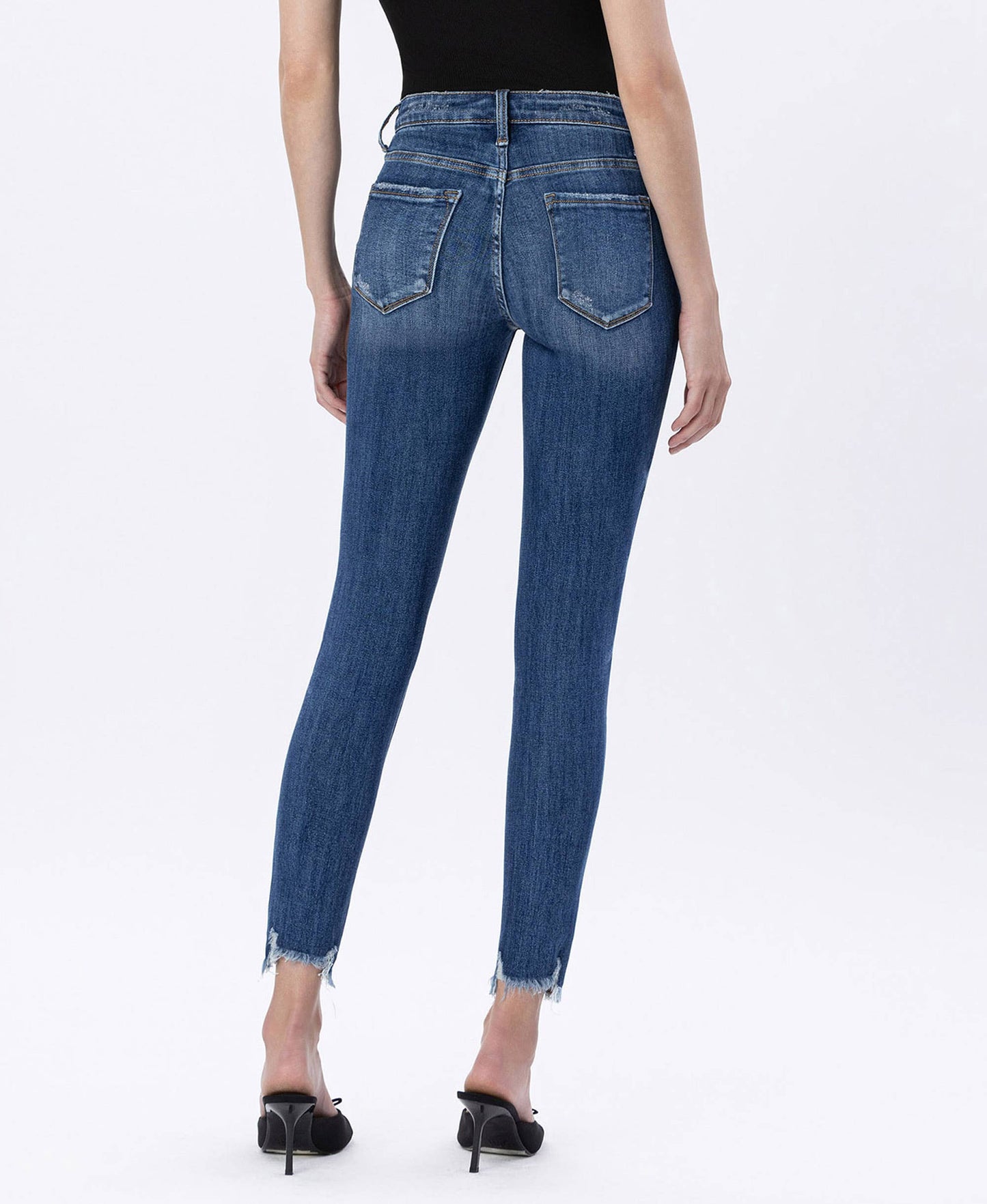 HIGH RISE DISTRESSED HEM SKINNY JEANS