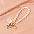 PEARL WRISTLET SEASHELL BAG KEYCHAINS